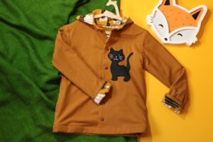 Bluza dwustronna z kotem (122 cm)
