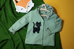 Bluza dwustronna z kotem (104 cm)
