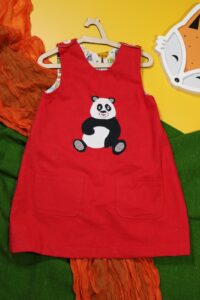 Czerwona sukienka dwustronna z pandą (116 cm)