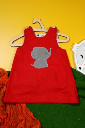 Czerwona sukienka dwustronna ze słoniem (74 cm)