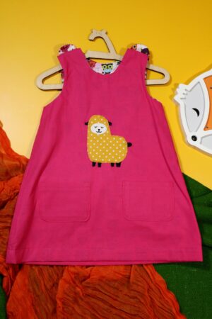 Różowa sukienka dwustronna z owieczką (98 cm)