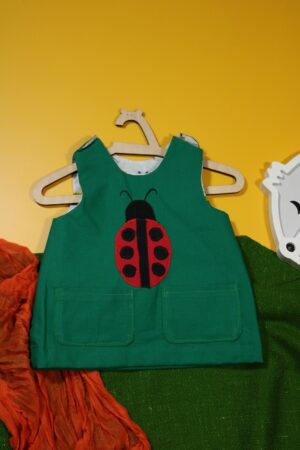 Zielona sukienka dwustronna z biedronką (62 cm)