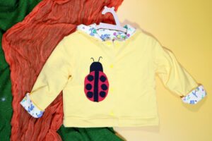 Bluza dwustronna z biedronką (74 cm)